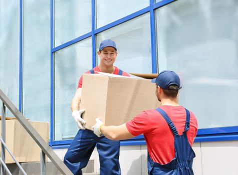 Staff preparing workstation items for an office move in Crooklog